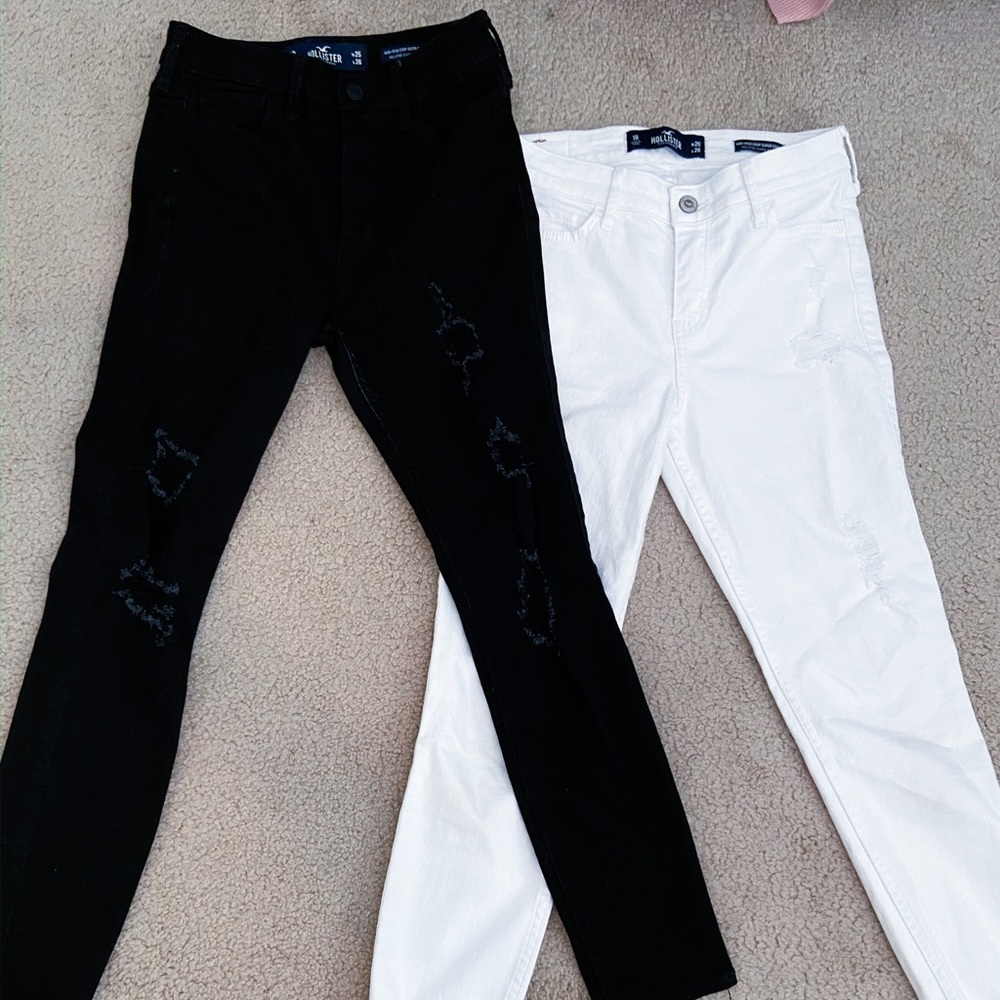 2 pairs of black and white Hollister jeans!